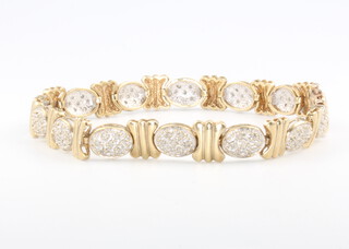 A 9ct yellow gold diamond set bracelet 11.2 grams, 8cm 