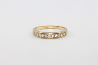 An 9ct yellow gold diamond ring, size I 1/2, 1.5 grams 