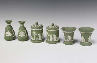 A pair of Wedgwood green Jasperware vases marked 72 9cm, pair of ditto jars and covers 9cm and 2 club shaped vases 12cm 