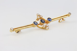 A 15ct yellow gold sapphire and seed pearl bar brooch 2.7 grams, 55mm