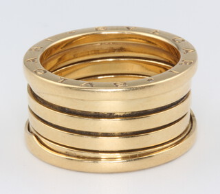 An 18ct yellow gold Bulgari style expanding wedding band, size R, 13 grams