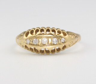 An 18ct yellow gold diamond 5 stone ring size N, 2.4 grams