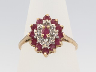 A 9ct yellow gold ruby and diamond cluster ring 2.5 grams, size R 