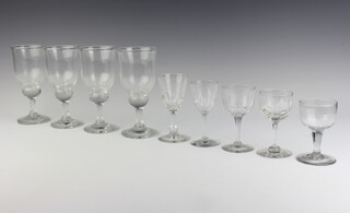 Four 19th Century bell shaped wine glasses together with four 19th Century liqueur glasses with panel cut decoration and 1 other