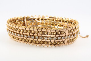 An 18ct yellow gold pearl set bracelet 41.2 grams 
