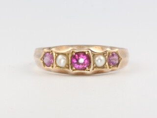 A 9ct yellow gold ruby and pearl ring, size N, 2.1 grams 