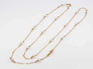 An 18ct yellow gold seed pearl set necklace 64cm, 5.4 grams 