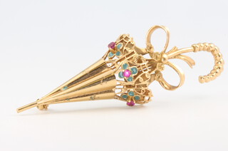 An 18ct yellow gold gem set parasol brooch, 7.8 grams