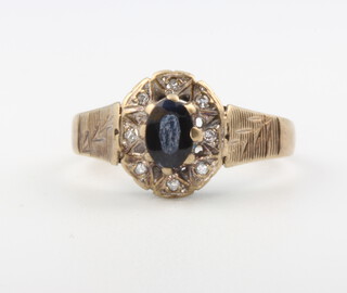 A 9ct yellow gold sapphire and diamond cluster ring, size P, 3.3 grams 