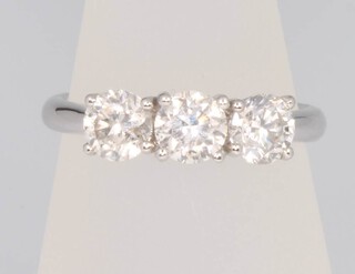 An 18ct white gold 3 stone brilliant cut diamond ring approx 1.54ct, size M