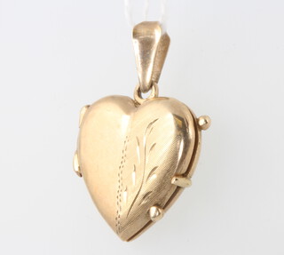 A 9ct yellow gold heart locket 5 grams