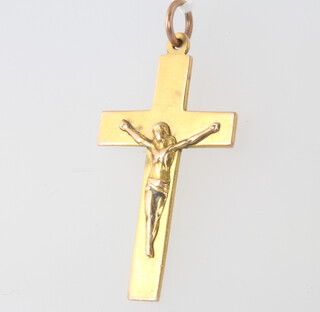 A 9ct yellow gold crucifix pendant 2.2 grams 