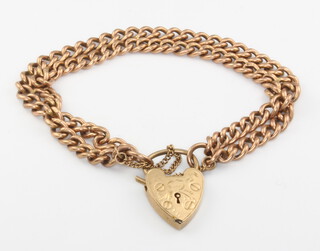 A 9ct yellow gold double strand bracelet and heart padlock 25.6 grams