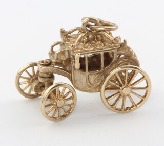 A 9ct yellow gold carriage charm 5.2 grams 