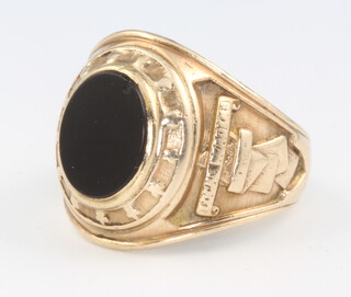 A 9ct yellow gold onyx set fraternity ring 14.1 grams, size Q 1/2