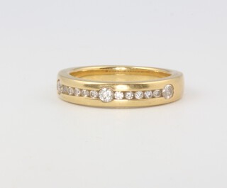 An 18ct yellow gold diamond band, size I, 4.5 grams