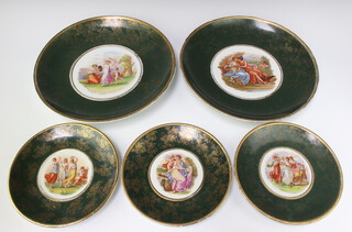 A pair of Berlin style green and floral patterned plates decorated classical scenes and with green banding 45cm (cracked), 3 ditto plates 22cm (1 cracked) 
