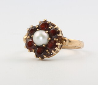 A 9ct yellow gold pearl and garnet ring size L, 2.8 grams