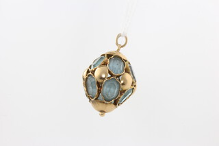 A 9ct yellow gold blue topaz charm