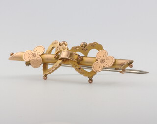 A 9ct yellow gold sweetheart brooch, 2.4 grams