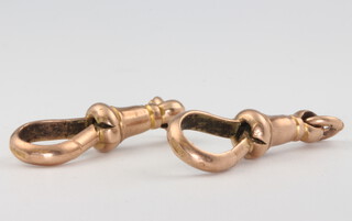 Two 9ct gold swivels, 5.2 grams
