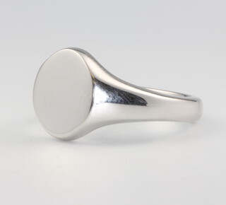 A 9ct white gold signet ring, size X 1/2, 12.1 grams