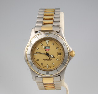 A gentleman's 2 colour Tag Heuer professional calendar wristwatch 
