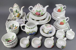 A quantity of Portmeirion tableware comprising coffee pot, tea pot (chip to spout and handle f), 6 dinner plates (1 chipped, 1 with crazing), large jug (chip to rim) 2 small jugs (1 chipped), 6 mugs (seconds), 5 shallow bowls, 7 pudding bowls, 7 shallow bowls (5 seconds), lidded jar and cover, 8 various saucers, large circular bowl, 6 bowls (2 seconds), 6 tea plates, rectangular casserole dish, 6 knives, forks and spoons, together with 11 white unmarked saucers 