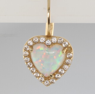 A 14ct yellow gold opal earring