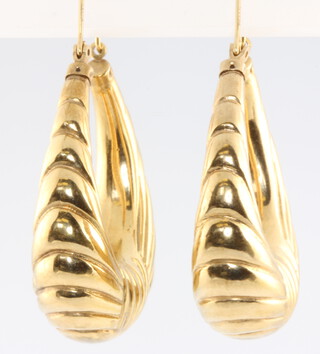 A pair of 9ct yellow gold earrings 7.5 grams