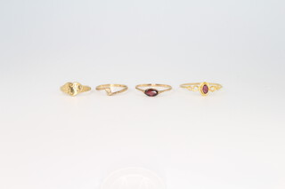 Three 9ct yellow gold gem set rings, 4 grams gross and 1 gold plated  size F, I, P and X