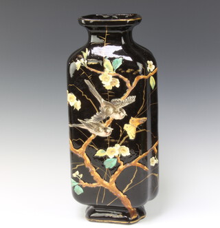A Victorian Art Nouveau black glazed and floral patterned vase decorated birds amongst branches 46cm h 