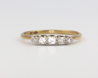 An 18ct yellow gold 5 stone diamond ring size O 1/2, 1.9 grams 