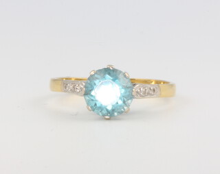 An 18ct yellow gold blue topaz and diamond dress ring size P, 3.1 grams 