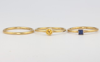 Three 18ct yellow gold rings, 2 gem set, size N, 4.8 grams