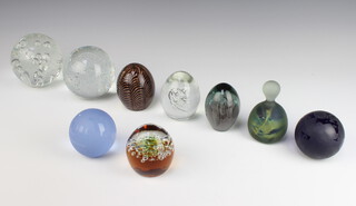 A Murano paperweight together with 8 others 