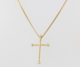 An 18ct yellow gold diamond set cross pendant and chain, 7.4 grams