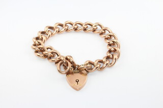 A 9ct yellow gold bracelet with heart shaped padlock 17.7 grams