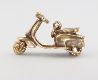 A 9ct yellow gold moped charm 3.9 grams