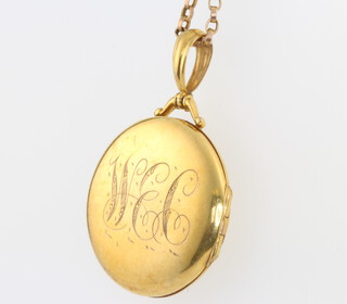 A 9ct yellow gold locket and chain 10.4 grams 