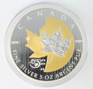 A 2013 Canadian anniversary maple leaf design silver 5 oz medallion, boxed, 157.6 grams 