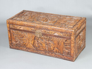 A Chinese twin handled carved hardwood coffer with hinged lid, 43cm h x 98cm w x 44cm d  