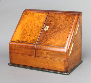 A Victorian walnut wedge shaped stationery box with stepped and fitted interior, the base with secret drawer 23cm h x 29cm w x 19cm d 