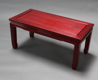 A Chinese rectangular hardwood coffee table raised on square supports 41cm h x 91cm w x 45cm d 