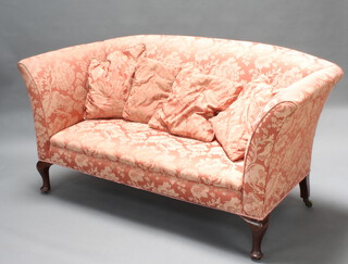 A 1920's Georgian style sofa upholstered in pink floral material raised on cabriole supports 85cm h x 165cm w x 77cm d 