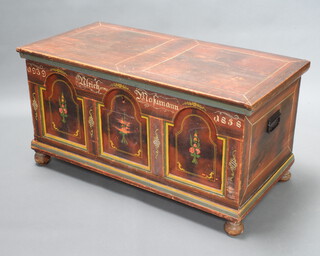 A 19th Century Eastern European painted pine coffer with hinged lid, the interior fitted a candle box raised on bun feet 56cm h x 109cm w x 54cm d 