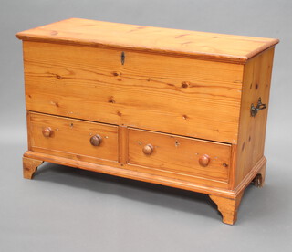 A Victorian pine mule chest with hinged lid, the base fitted 2 drawers, raised on bracket feet 73cm h x 111cm w x 50cm d