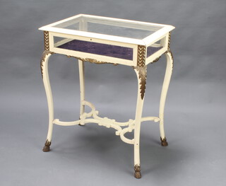 An Edwardian white and gilt painted rectangular bijouterie table with hinged lid, raised on cabriole hoof supports 76cm h x 63cm w x 46cm d 