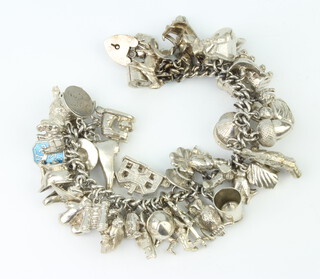 A silver charm bracelet 130 grams