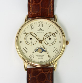 A gentleman's 9ct gold Sewills millennium limited edition wristwatch with moonphase dial and 2 subsidiary dials on a leather strap 